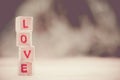 Love message written in wooden blocks. Royalty Free Stock Photo