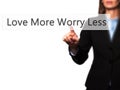 Love More Worry Less - Businesswoman hand pressing button on touch screen interface.