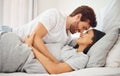 Love, morning and wake up with couple in bed together for care, communication and happy. Sleeping, relax and smile with Royalty Free Stock Photo