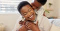 Love, mother and excited child hug playing together bonding in bedroom at house. Happy black woman and baby affection Royalty Free Stock Photo