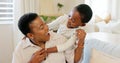 Love, mother and excited child hug playing together bonding in bedroom at house. Happy black woman and baby affection Royalty Free Stock Photo