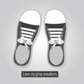 Love my gray sneakers - A pair of cute gray sneakers poster icon with tied white shoelaces on gray gradient