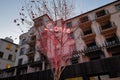 Love neon sign on a tree near a Christmas castle in Qinhuangdao, China