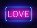 Love neon text banner. Happy Valentine Day frame background. Romantic electric sign on night brick wall. Social media