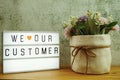 We love our customer word in light box business concept background Royalty Free Stock Photo