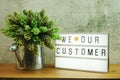 We love our customer word in light box business concept background Royalty Free Stock Photo