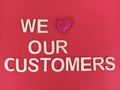 We love our customers sign Royalty Free Stock Photo