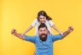 Love in our family grows deep. Happy family celebrate yellow background. Father and little daughter winth winning