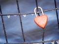 heart padlock on icy fence Royalty Free Stock Photo