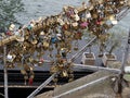 Love padlocks attached along the river Seine in Paris, France