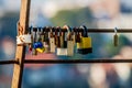 Love Padlocks: A sweet and sentimental gesture where couples lock padlocks onto a fence on a bridge, representing their deep love