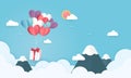 illustration of love and valentine\'s day with a paper heart balloon and gift box float in the blue sky. Royalty Free Stock Photo