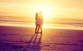 In love in paradise. Full length shot of an affectionate mature couple dancing on the beach at sunset. Royalty Free Stock Photo