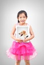 Love pet concept.little girl holding a picture of her dog Royalty Free Stock Photo