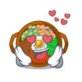 In love plate containing bibimbap cartoon on table Royalty Free Stock Photo