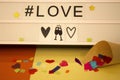 Love poster with stars, confetti cone and hashtag