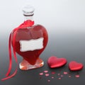 Love Potion Bottle with Red Heart Decorations Royalty Free Stock Photo