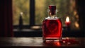 Love potion. A single glass bottle filled with red liquid. Symbolizing a magical elixir of love.