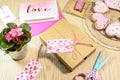 Love present,Begonia,cards and cookies on the wooden table
