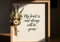 Love Quote Framed with Dried Flowers in Soft Light Royalty Free Stock Photo