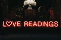 Love Readings words in neon light signage.