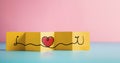 Love and Relationship Concept. Text and Heart Symbol on Fold Paper Card