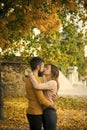 Love relationship and romance. Autumn happy couple of girl and man outdoor Royalty Free Stock Photo
