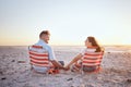 Love, relax and couple holding hands on the beach for comfort, peace and wellness while on Toronto Canada vacation Royalty Free Stock Photo