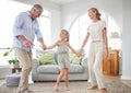 Love, retirement and family dancing in home living room together to bond with cute girl child. Happy senior grandmother Royalty Free Stock Photo