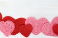 Love romance concept. Frame from red and pink Hearts on natural wood surface. Valentines Day background Royalty Free Stock Photo