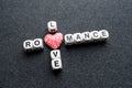 Love Romance Crossword Block Text With Pink Thread Heart On Dark