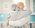 Love, romance and senior couple hugging in the kitchen together in their modern house. Happy, sweet and elderly man