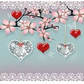 Love sakura tree with hanging red and lace hearts Royalty Free Stock Photo