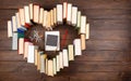 Love science concept. Heart shape of books, graduate cap and molecule model on wooden desk. Take a degree in natural Sciences