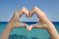 Love sea hand heart gesture Royalty Free Stock Photo
