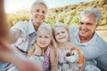 Love, selfie and grandparents with girls in park, smile or loving together for vacation, break or bonding. Portrait