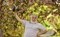 he love selfie. tourism and holiday. traveler camera man under sakura bloom. travel concept. male photographer enjoy Royalty Free Stock Photo