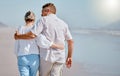 Love, senior couple and beach for walking, vacation and happy being loving together, travel or hug. Romance, mature man Royalty Free Stock Photo