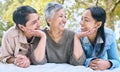 Love, senior women and friends at park on picnic blanket, bonding and enjoying quality time together outdoors. Peace Royalty Free Stock Photo