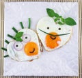 Love shaped two fried eggs Royalty Free Stock Photo