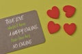 Love shapes and brown card with text TRUE LOVE DOESN`T HAVE A HAPPY ENDING, TRUE LOVE HAS NO ENDING