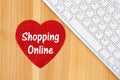 Love shopping online with a red glitter heart with a keyboard