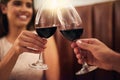 Love should be celebrated on a daily basis. a couple making a toast while on a romantic date.