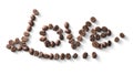 Love sign with coffee beans arranged over white background Royalty Free Stock Photo