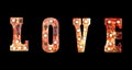 Love sign. Love word light bulbs on black background. Background for valentines day concept Royalty Free Stock Photo