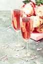 Love simbols - Bouquet of white and red roses, gift box, glasses with pink or rose champagne or sparcling wine for pair for St.