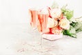 Love simbols - Bouquet of white and red roses, gift box, glasses with pink or rose champagne or sparcling wine for pair for St.