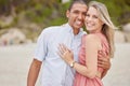 Love, smile and couple outdoor portrait at the beach for the holiday vacation. Happy marriage with husband and wife or Royalty Free Stock Photo