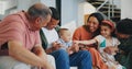 Love, smile and happy big family on sofa in the living room at modern home together. Bonding, care and young kids Royalty Free Stock Photo