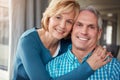 Love speaks louder than words. Portrait of a happy and affectionate mature couple enjoying the day together at home.